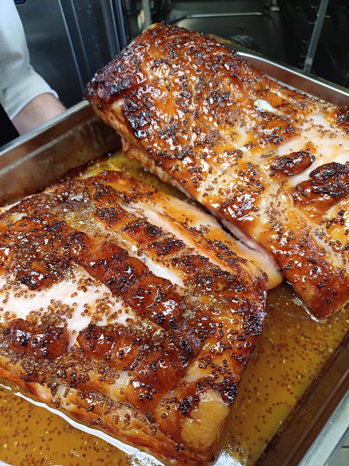 Mustard glazed pork loin in the roasting tray