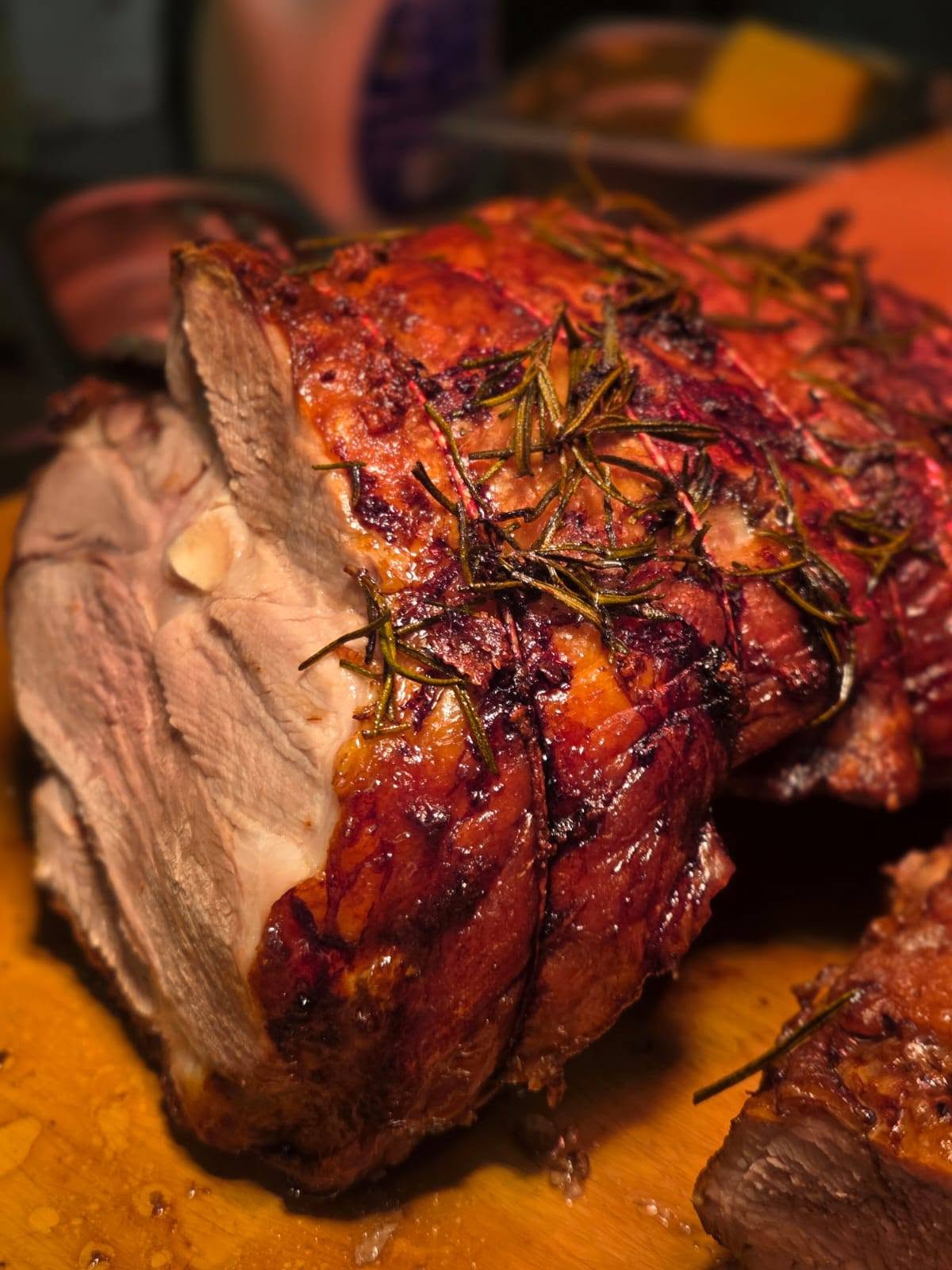 Rosemary roast lamb resting on the board